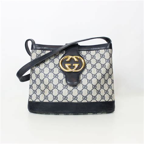 gucci logo black bag|old gucci emblem.